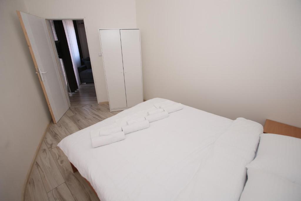 Postel nebo postele na pokoji v ubytování Vurk INN Paracin