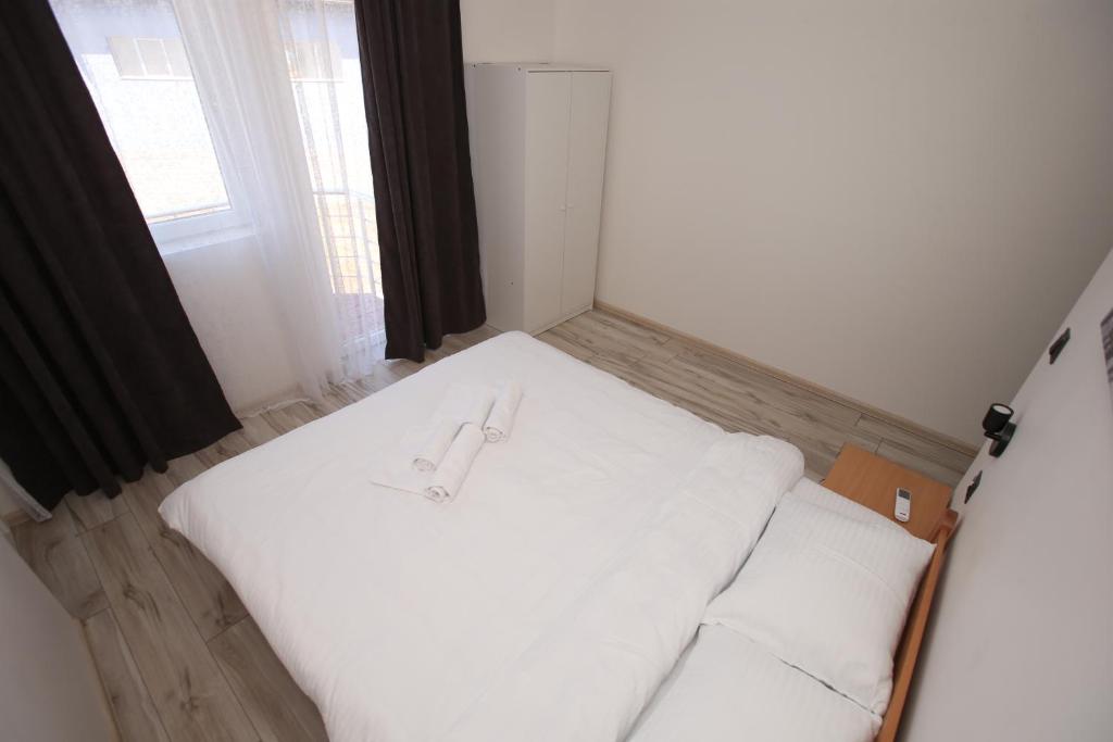 Postel nebo postele na pokoji v ubytování Vurk INN Paracin