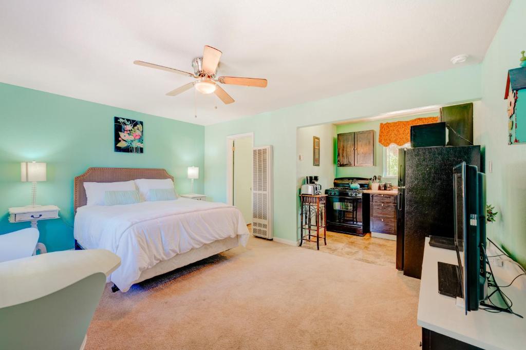 a large bedroom with a bed and a kitchen at Pine Tree Place - Unit 3 in South Lake Tahoe