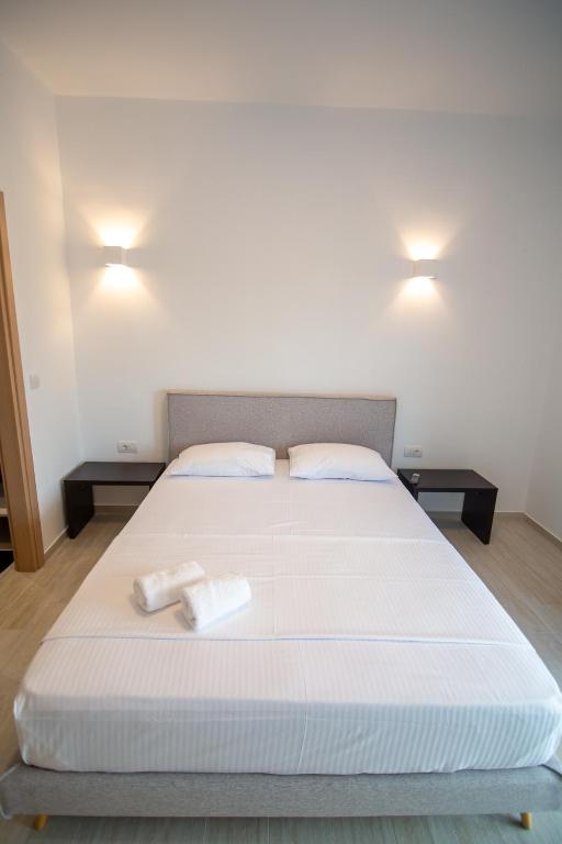 Postel nebo postele na pokoji v ubytování elea resort 2