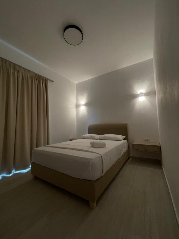 Postel nebo postele na pokoji v ubytování elea resort 2