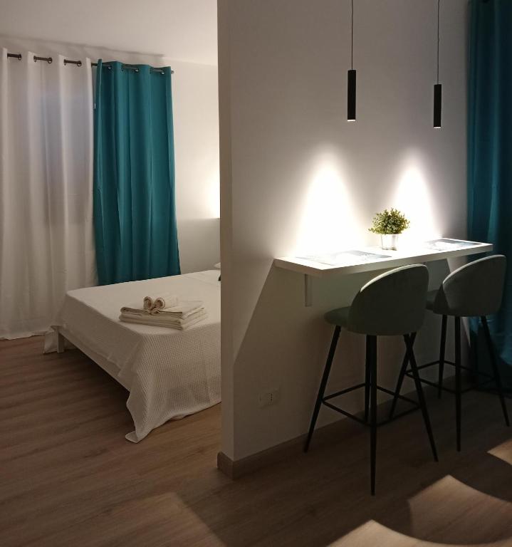 Postel nebo postele na pokoji v ubytování Narciso boutique apartment