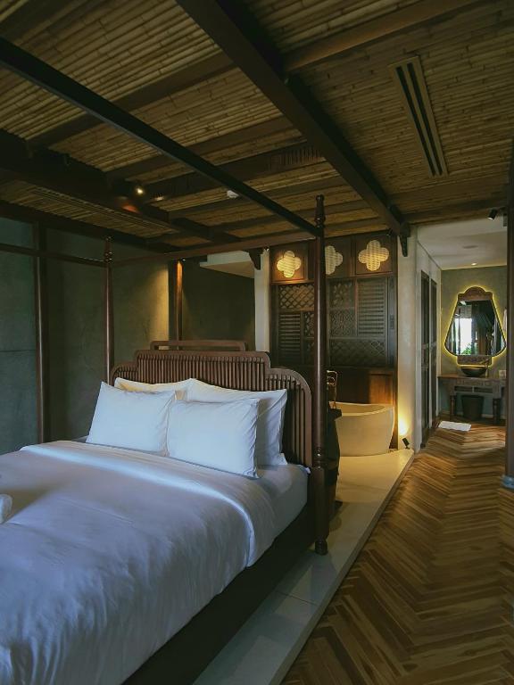 Postel nebo postele na pokoji v ubytování MINH - CASA