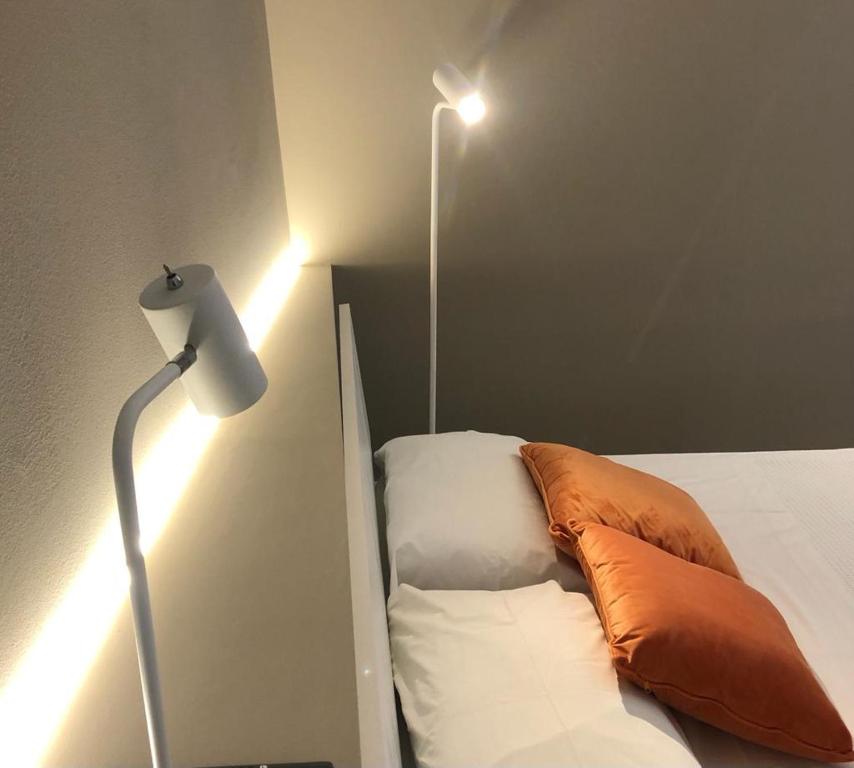 Postel nebo postele na pokoji v ubytování Narciso boutique apartment