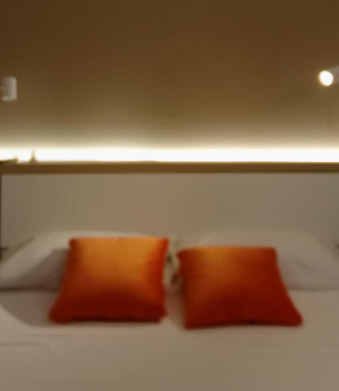 Postel nebo postele na pokoji v ubytování Narciso boutique apartment