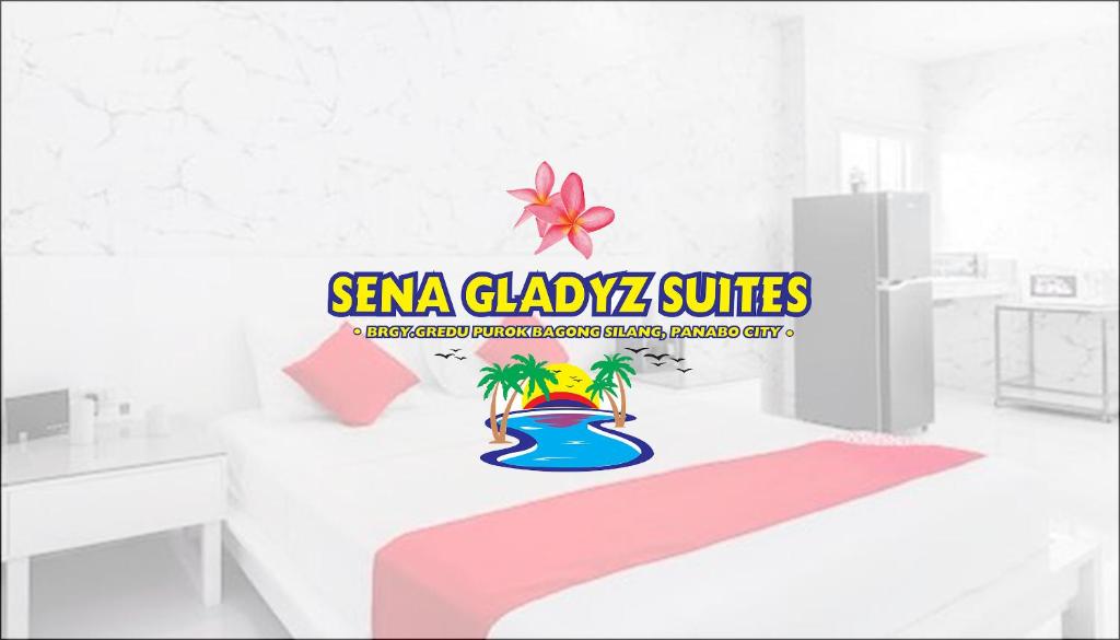 Postel nebo postele na pokoji v ubytování Sena Gladyz Suites