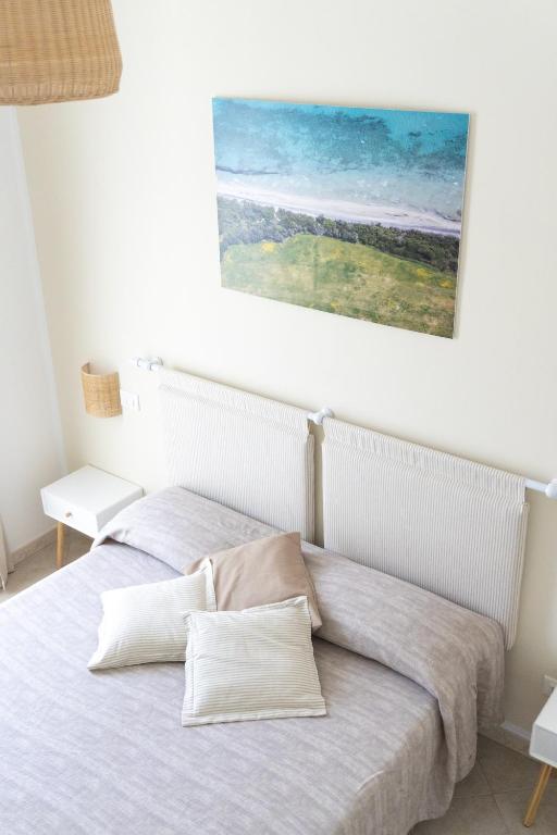 Postel nebo postele na pokoji v ubytování Notos b&b
