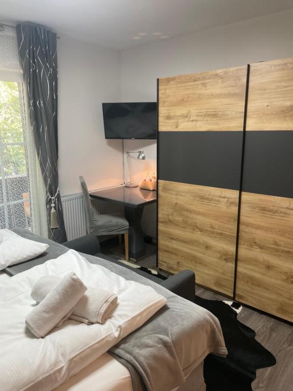 Postel nebo postele na pokoji v ubytování Hotel Il David