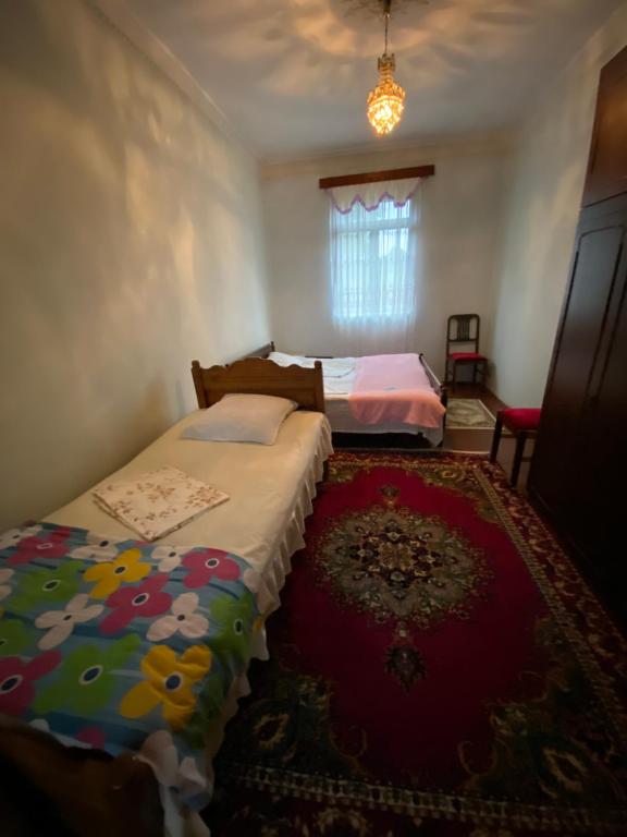 Postel nebo postele na pokoji v ubytování Guest House Gio