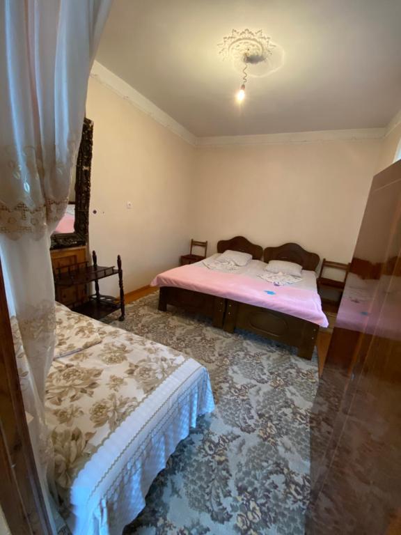 Postel nebo postele na pokoji v ubytování Guest House Gio