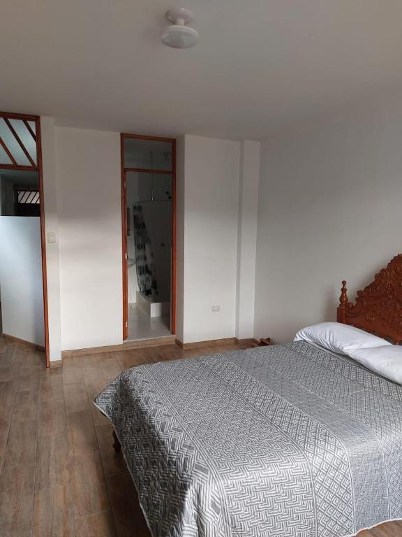 Postel nebo postele na pokoji v ubytování Hospedaje Margarita