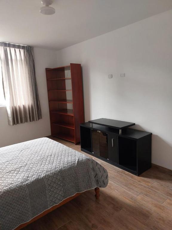 Postel nebo postele na pokoji v ubytování Hospedaje Margarita