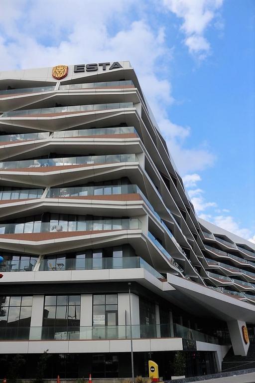 a tall building with a sign on the side of it at BENESTA BEYOGLU in Istanbul