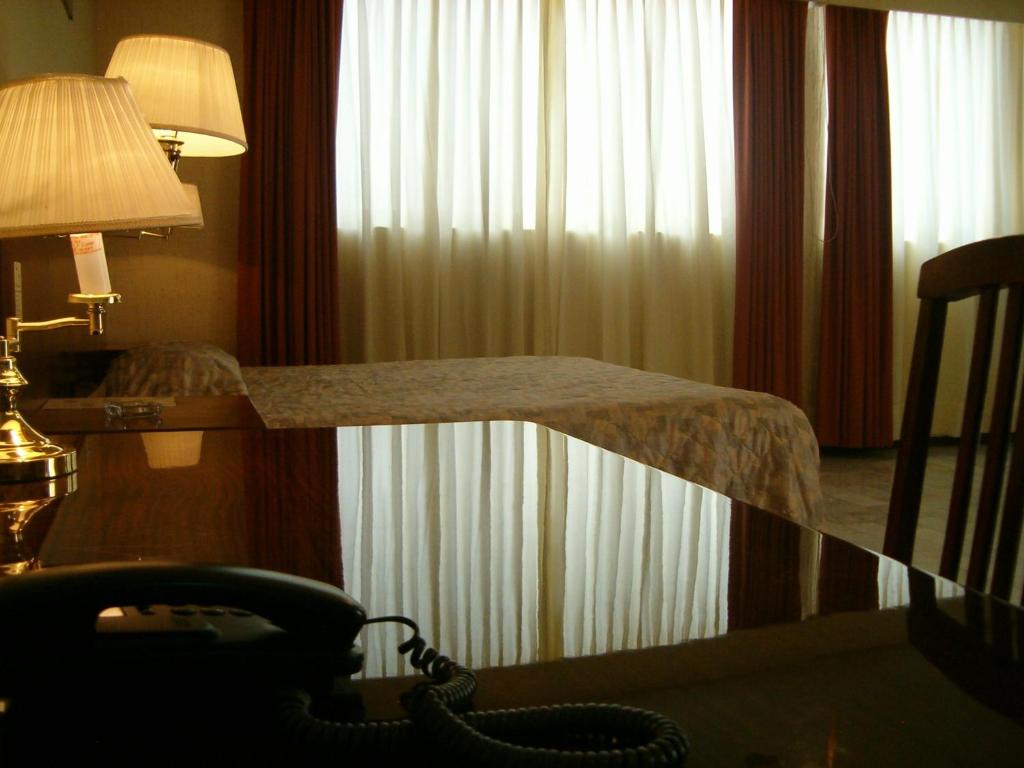 Postel nebo postele na pokoji v ubytování Hotel Flamingo Kristal