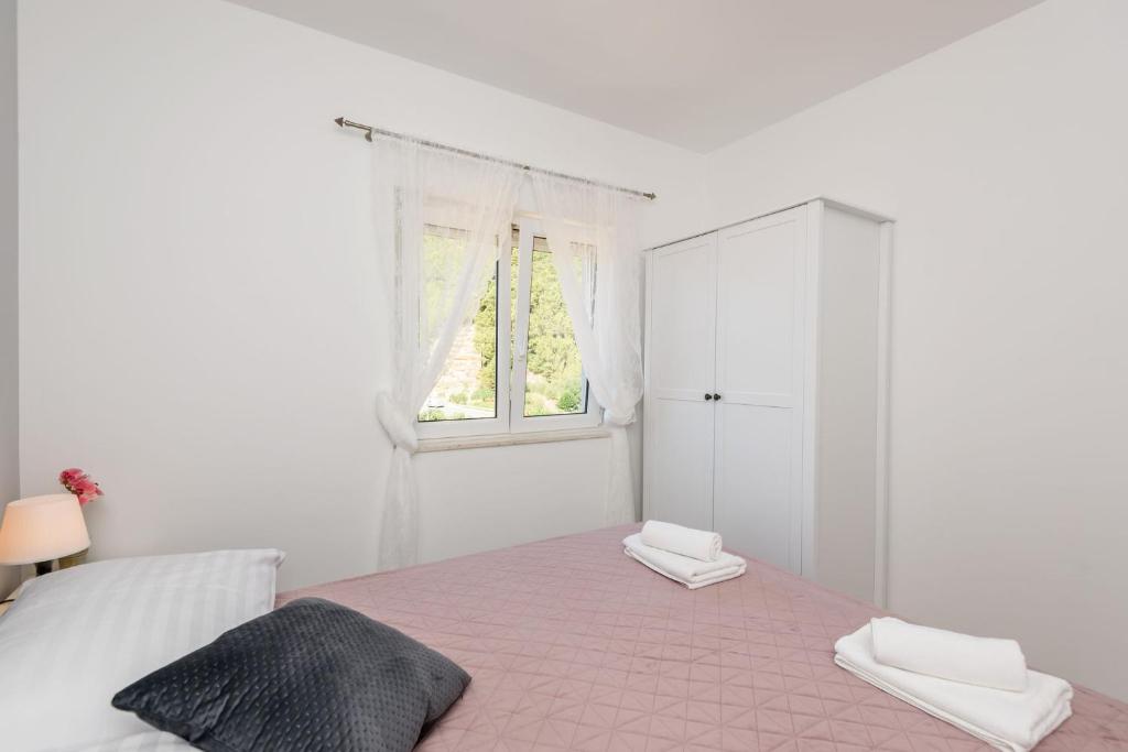 Posteľ alebo postele v izbe v ubytovaní Apartments Bjelis