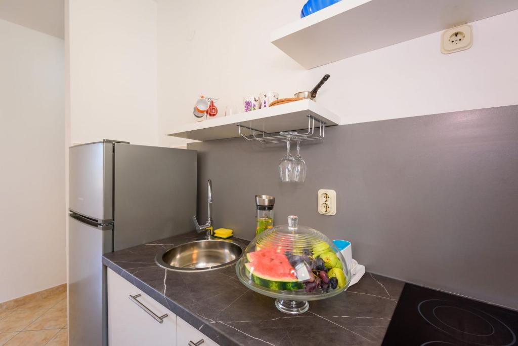 Kuchyňa alebo kuchynka v ubytovaní Apartments Bjelis