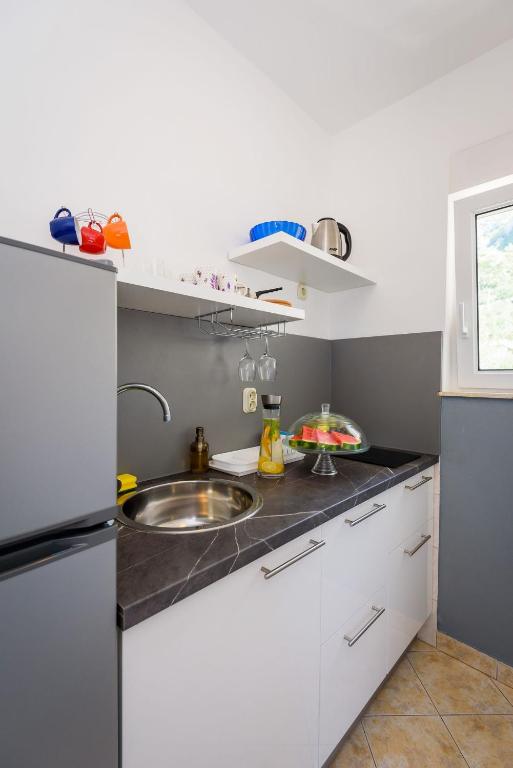 Kuchyňa alebo kuchynka v ubytovaní Apartments Bjelis