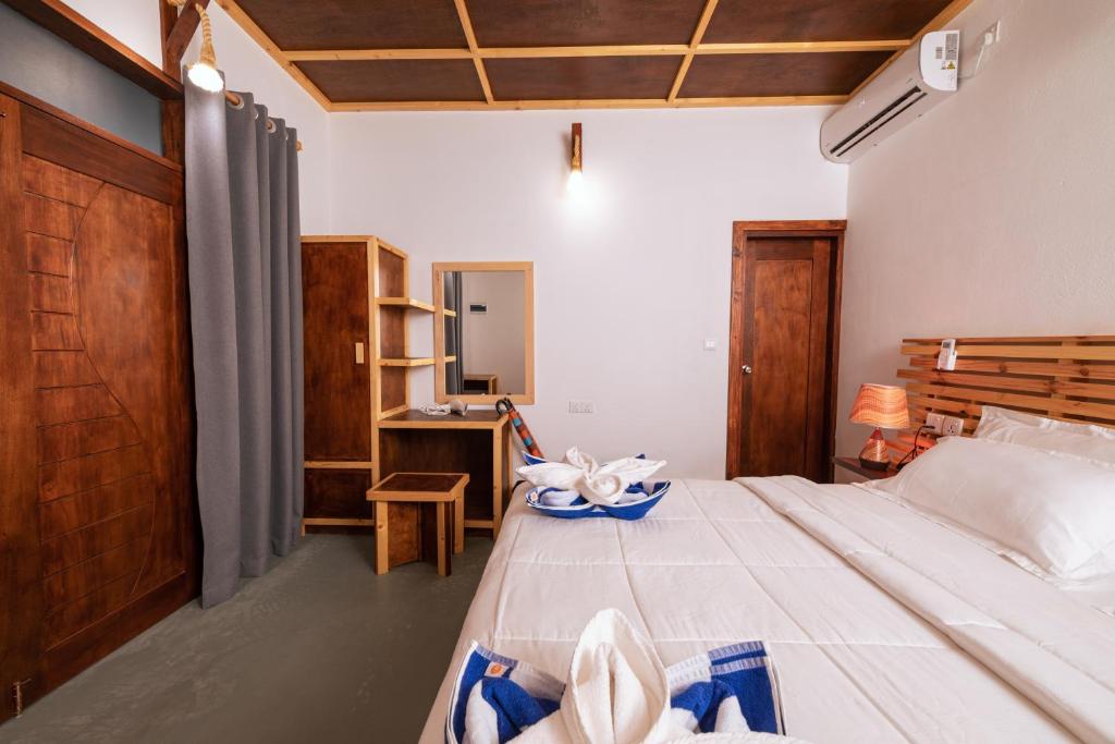 Postel nebo postele na pokoji v ubytování Vacanza Mathiveri