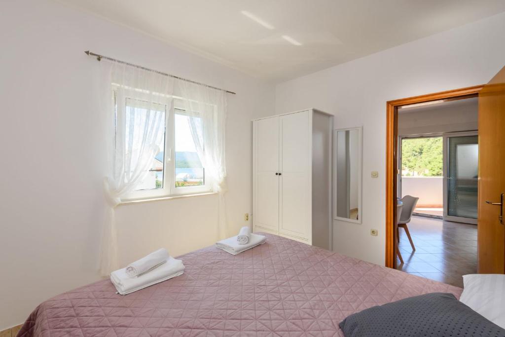 Posteľ alebo postele v izbe v ubytovaní Apartments Bjelis