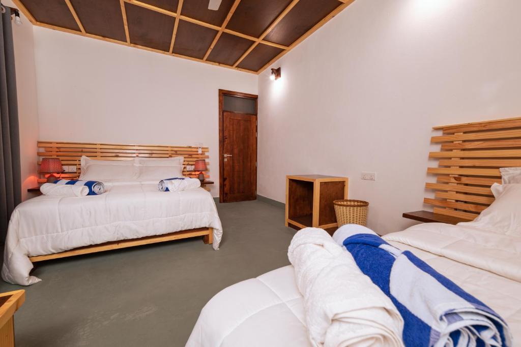 Postel nebo postele na pokoji v ubytování Vacanza Mathiveri