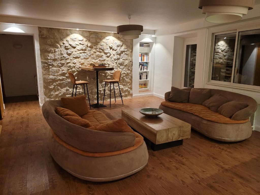 Posezení v ubytování Hôtel Restaurant Le Lachens