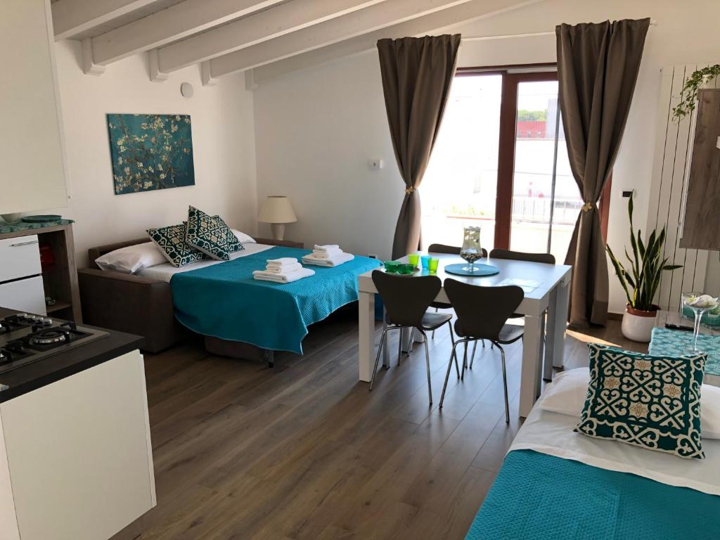 Postel nebo postele na pokoji v ubytování Tiffany room- vicinissima a Porto Cesareo