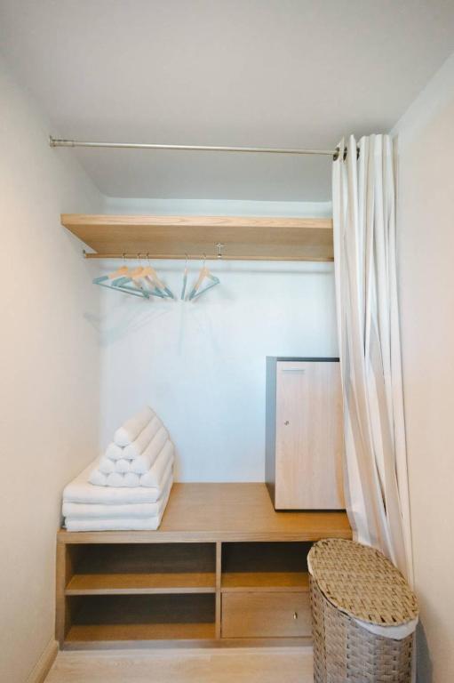 Postel nebo postele na pokoji v ubytování Chelona Beachfront Huahin
