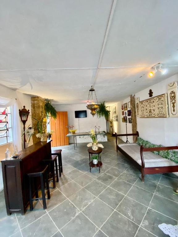 TV a/nebo společenská místnost v ubytování Hostel Dona Generoza