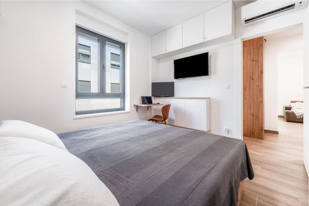 TV a/nebo společenská místnost v ubytování Apartment Emma Dubrovnik