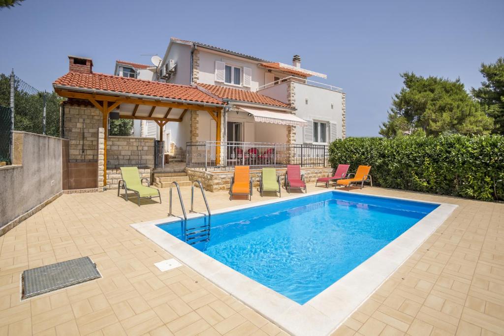 Fotografia z galérie ubytovania Family friendly house with a swimming pool Maslinica, Solta - 16782 v destinácii Grohote