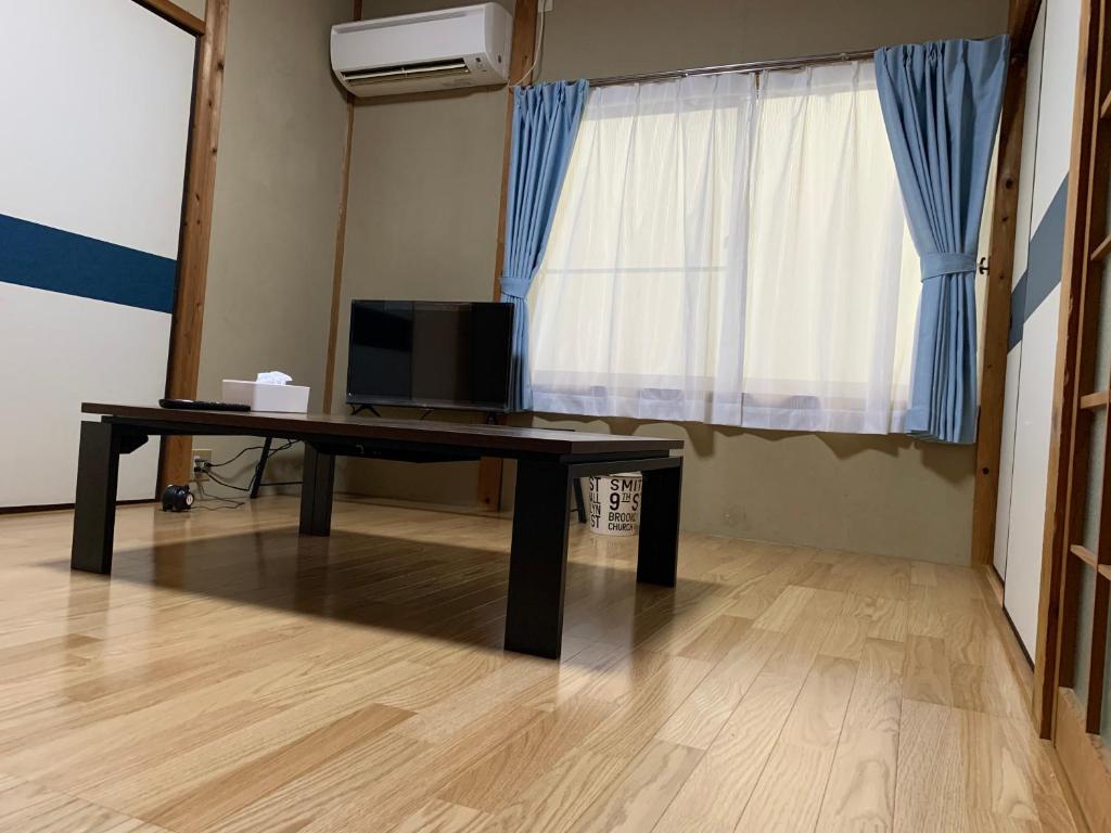 TV a/nebo společenská místnost v ubytování EBISUYA F-101 -Kumano Kodo-