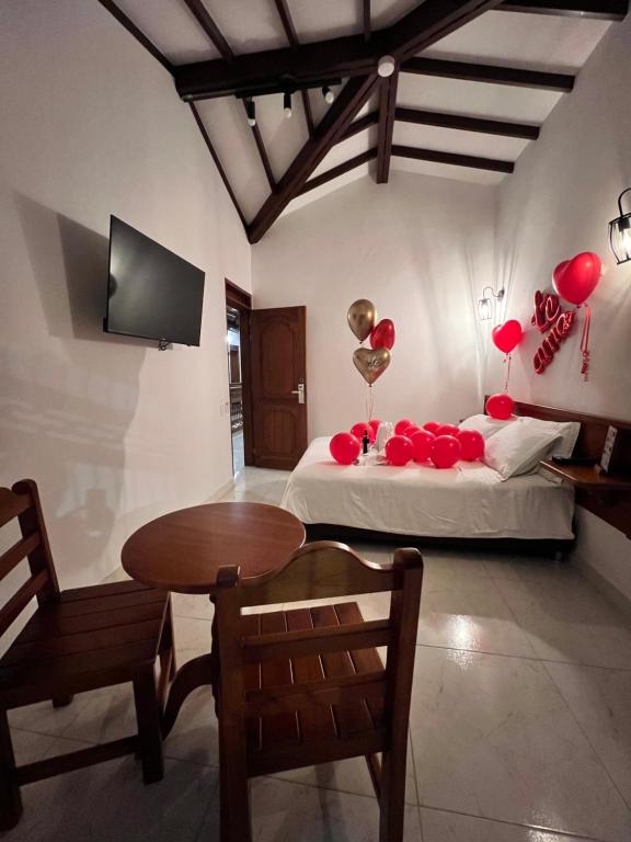 Postel nebo postele na pokoji v ubytování Casa Isabel Hotel