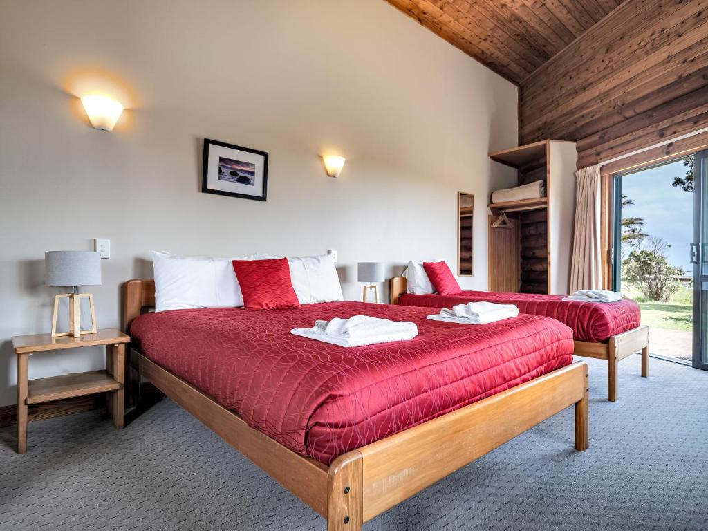 Postel nebo postele na pokoji v ubytování Shining Star Beachfront Accommodation