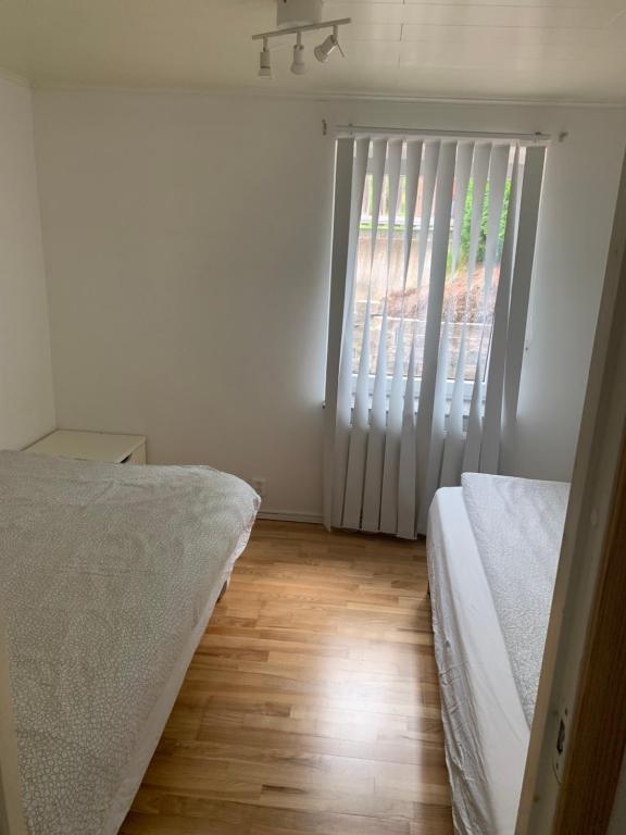 Postel nebo postele na pokoji v ubytování Child friendly Villa 4BR 10 min to Gothenburg City