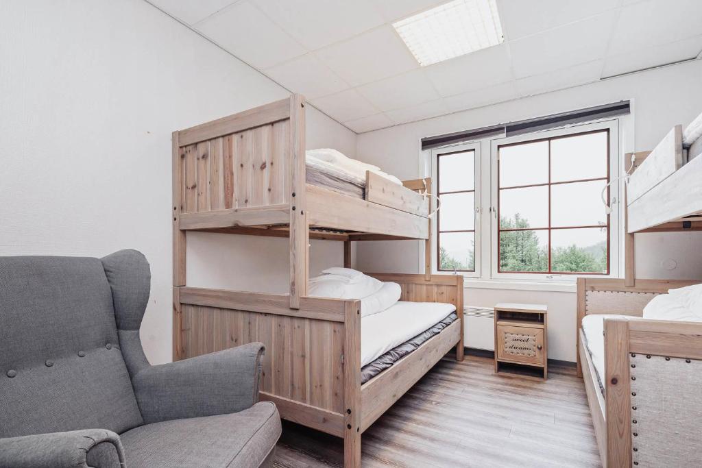 Postel nebo postele na pokoji v ubytování Basecamp Frich`s Hjerkinn