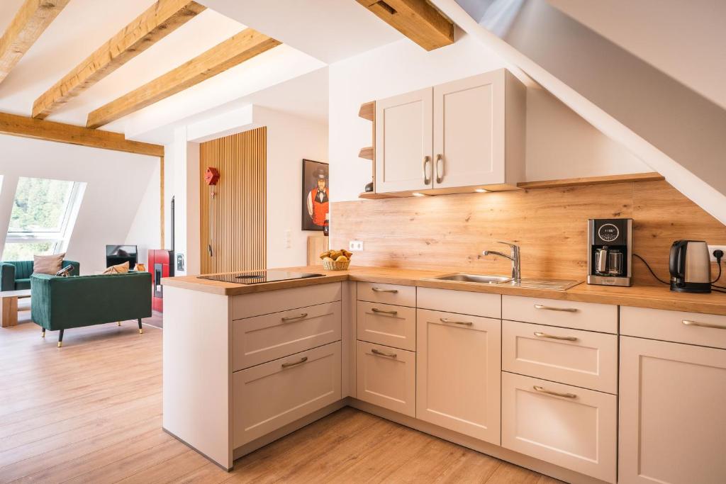 Kuchyň nebo kuchyňský kout v ubytování Hotel Großbach