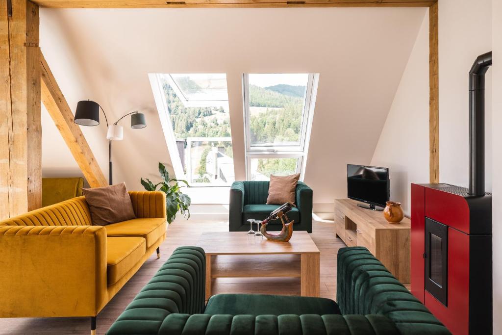 TV a/nebo společenská místnost v ubytování Hotel Großbach