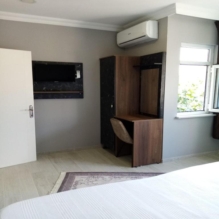 Yasin Apart hotel - Habitación Cuádruple