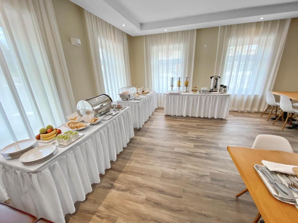Posezení v ubytování TOSCANINA Garni Hotel