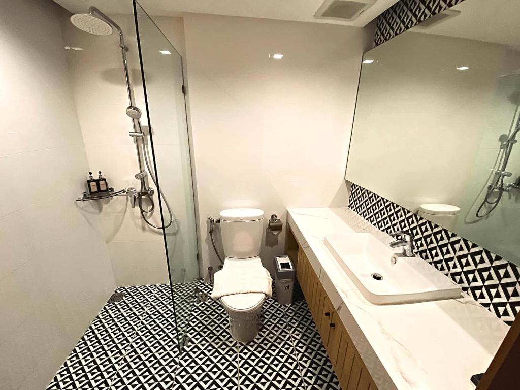 Koupelna v ubytování Sann Boutique Hotel