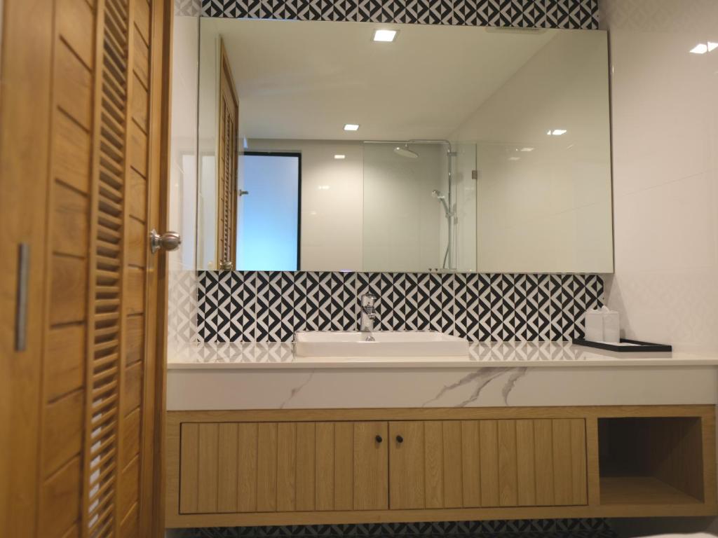 Koupelna v ubytování Sann Boutique Hotel