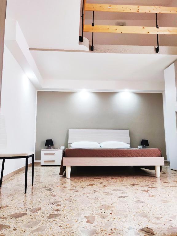 Postel nebo postele na pokoji v ubytování Wish Rooms Lecce