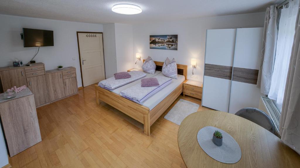 Postel nebo postele na pokoji v ubytování Haus Egger