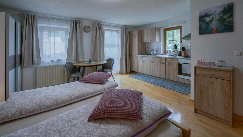 Postel nebo postele na pokoji v ubytování Haus Egger