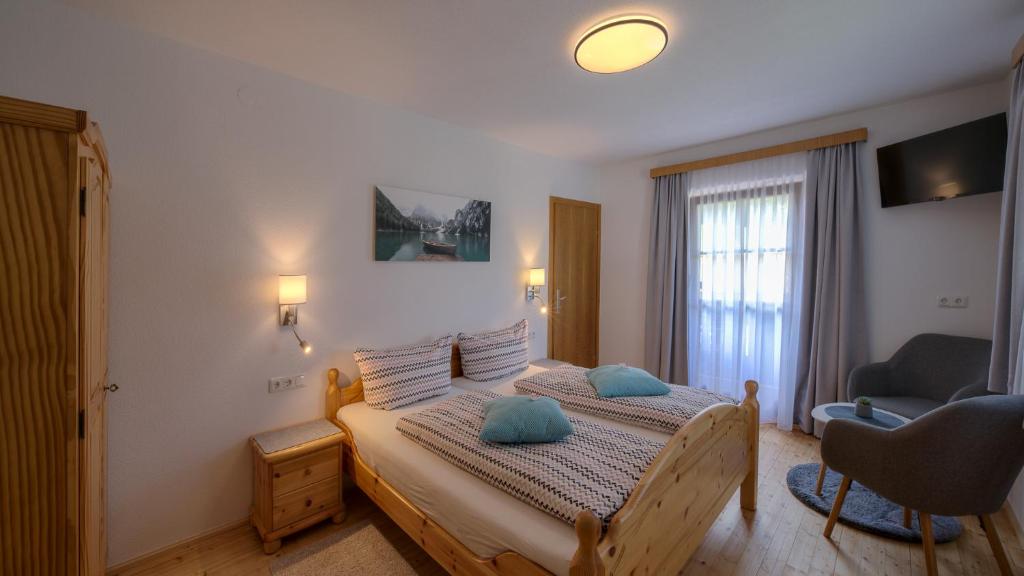 Postel nebo postele na pokoji v ubytování Haus Egger