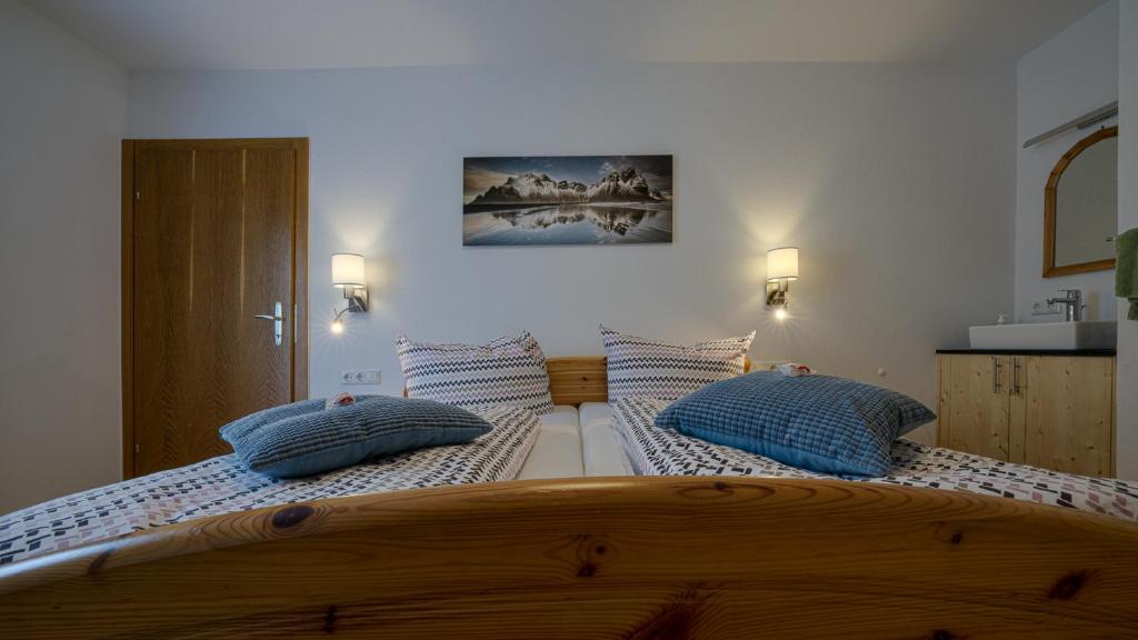 Postel nebo postele na pokoji v ubytování Haus Egger