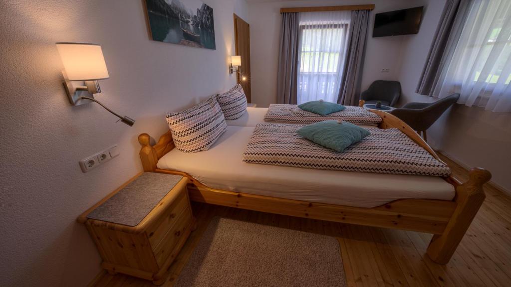 Postel nebo postele na pokoji v ubytování Haus Egger