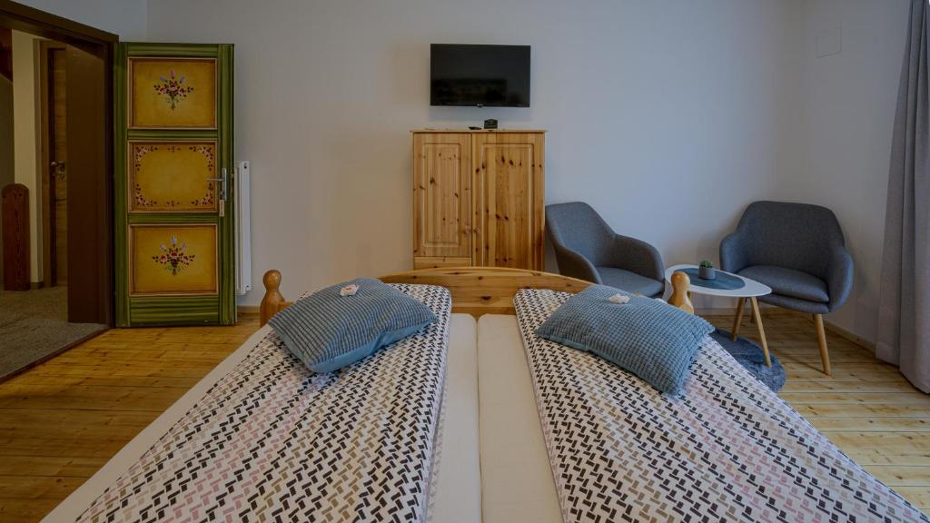 Postel nebo postele na pokoji v ubytování Haus Egger