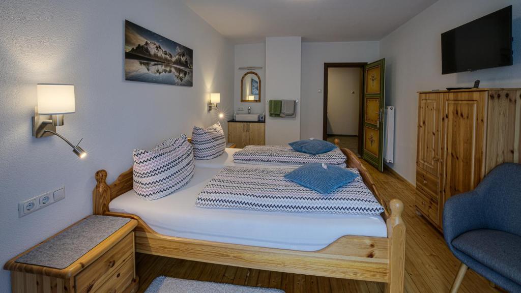 Postel nebo postele na pokoji v ubytování Haus Egger