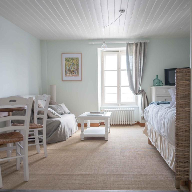 Posteľ alebo postele v izbe v ubytovaní La Maison du Vieux Port